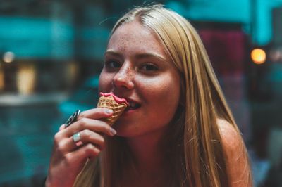 A woman enjoys an ice cream cone