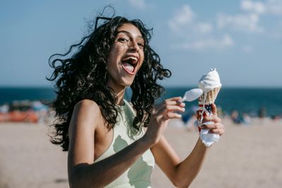 Happy woman with ice cream